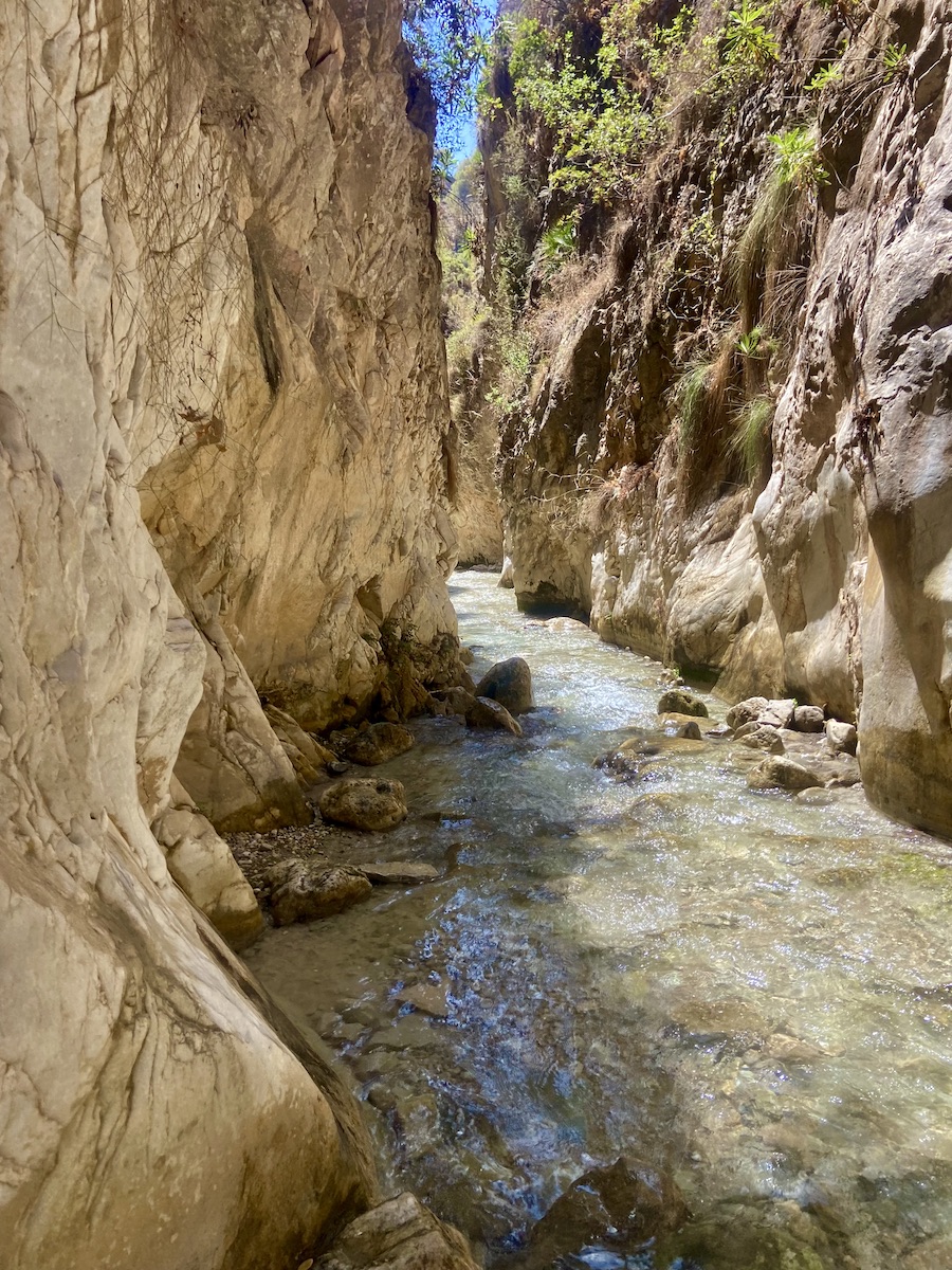 Walking through a river in Andalusia near Nerja
